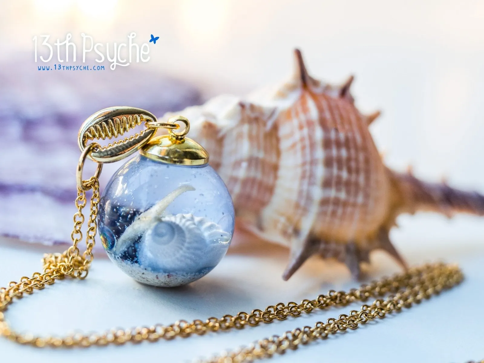 Ocean inspired Starfish and shells resin ball necklace